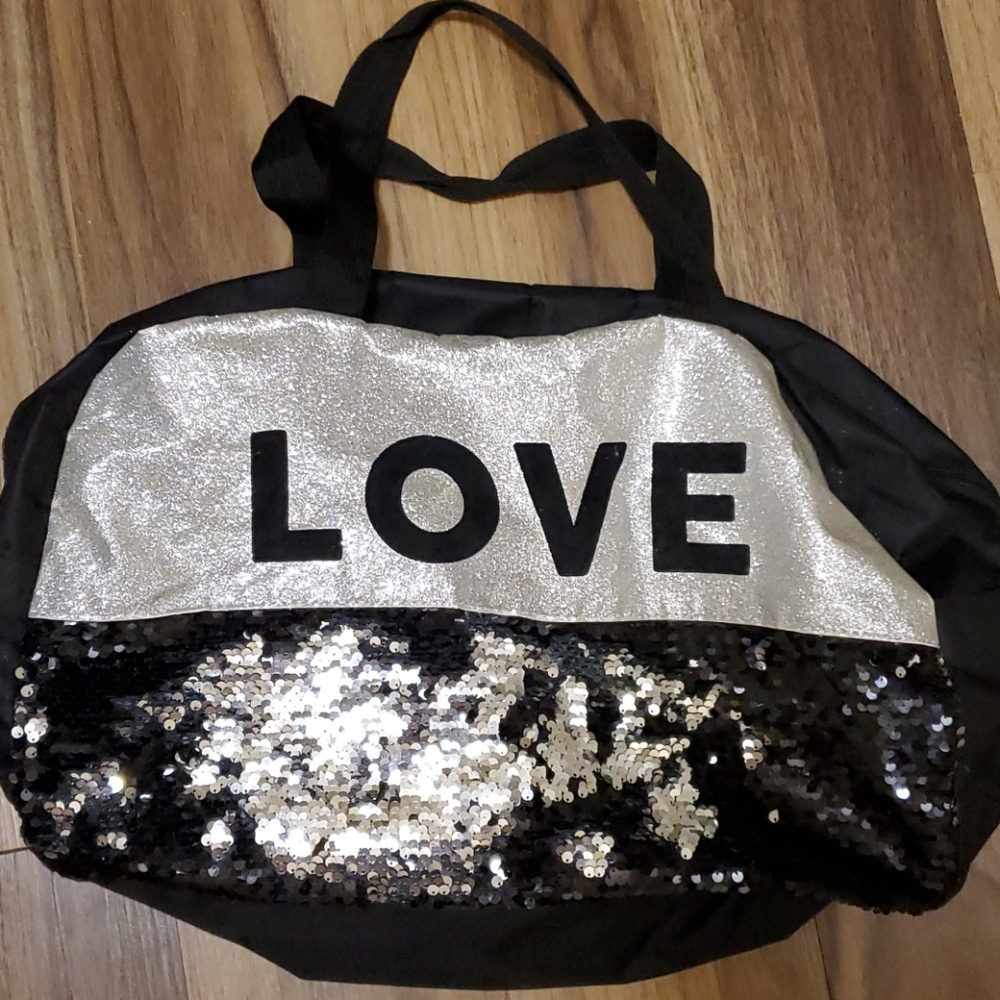 Black sequined duffle bag